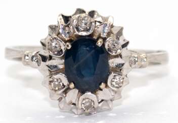 Ring, 750er WG, besetzt mit 1 oval facettiertem Saphir und 6 Brillanten, Ges.-Gew. 3,15 g, RG 55