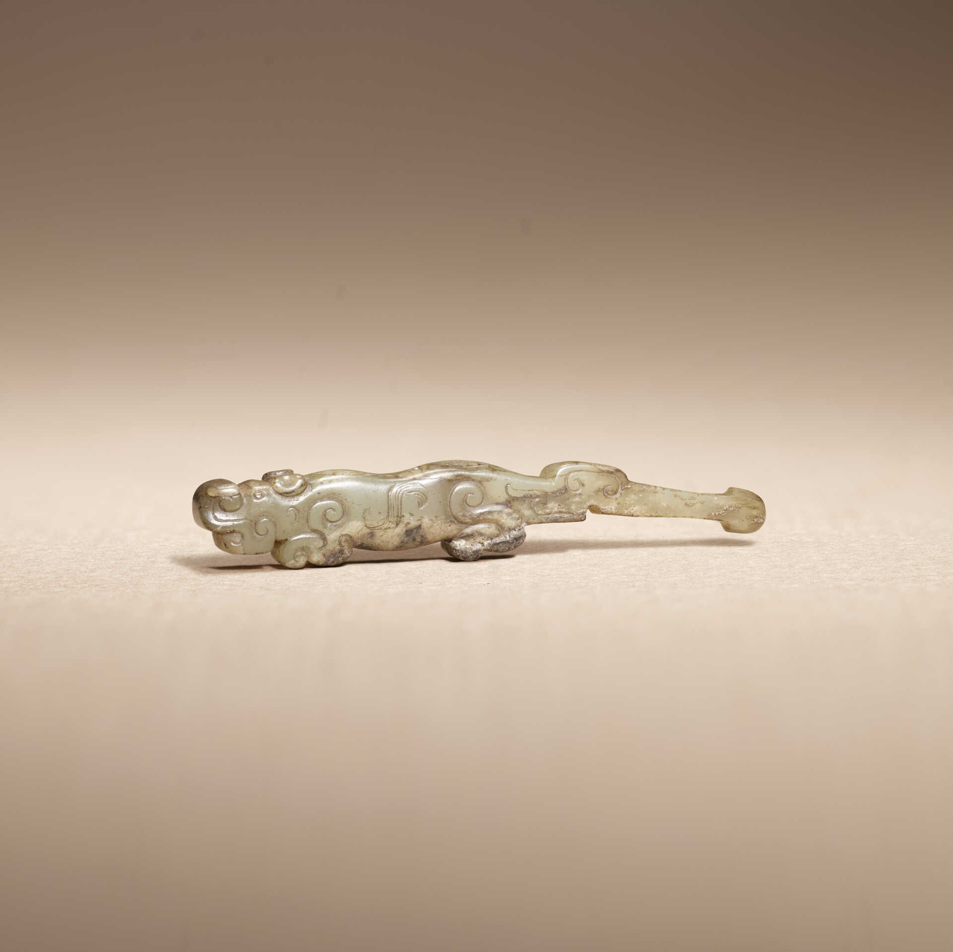 A JADE TIGER-FORM EAR PICK