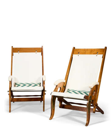 A PAIR OF MAHOGANY AND CANVAS FOLDING CAMPAIGN ARMCHAIRS - photo 1