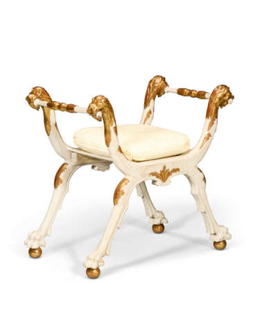 AN ITALIAN CREAM-PAINTED AND PARCEL-GILT CURULE STOOL - photo 1