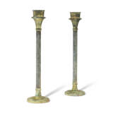 A PAIR OF PATINATED METAL CANDLESTICKS - photo 1