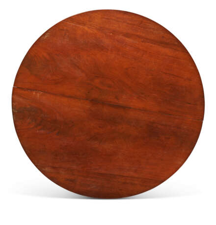 A CENTRAL EUROPEAN MAHOGANY AND PARCEL-EBONIZED CIRCULAR EXTENSION DINING TABLE - photo 5