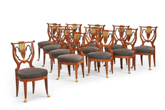 A SET OF TWELVE BIEDERMEIER MAHOGANY, EBONIZED AND PARCEL-GILT SIDE CHAIRS - фото 1