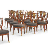 A SET OF TWELVE BIEDERMEIER MAHOGANY, EBONIZED AND PARCEL-GILT SIDE CHAIRS - фото 1