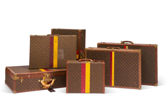 A SET OF SIX: PERSONALIZED MONOGRAM CANVAS HARDSIDED SUITCASES WITH BRASS HARDWARE - photo 1