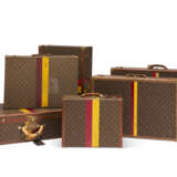 A SET OF SIX: PERSONALIZED MONOGRAM CANVAS HARDSIDED SUITCASES WITH BRASS HARDWARE - photo 1