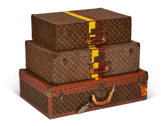 A SET OF THREE: PERSONALIZED MONOGRAM CANVAS HARDSIDED SUITCASES WITH BRASS HARDWARE - photo 1