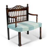 A GEORGE III PROVINCIAL FRUITWOOD AND EBONIZED LOW ARMCHAIR - фото 1