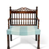 A GEORGE III PROVINCIAL FRUITWOOD AND EBONIZED LOW ARMCHAIR - фото 2