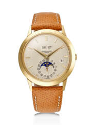 PATEK PHILIPPE, YELLOW GOLD PERPETUAL CALENDAR WRISTWATCH, WITH MOON PHASES, REF. 3450