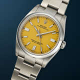 ROLEX, STAINLESS STEEL 'OYSTER PERPETUAL' WITH YELLOW DIAL, REF. 126000 - photo 2