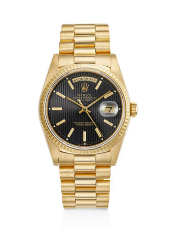 ROLEX, YELLOW GOLD 'DAY-DATE', WITH BLACK TAPESTRY DIAL, REF. 18238 - photo 1