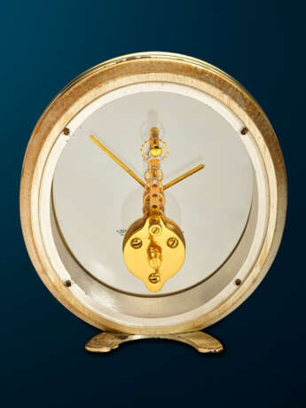 JAEGER-LECOULTRE, OVAL GILT BRASS SKELETONIZED TABLE CLOCK - фото 2