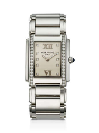 PATEK PHILIPPE, STAINLESS STEEL AND DIAMOND-SET 'TWENTY-4', REF. 4910/10A-011 - photo 1