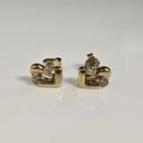 Ein Paar 14K-Diamant-Ohrstecker - Gelbgold 585/000 - photo 1