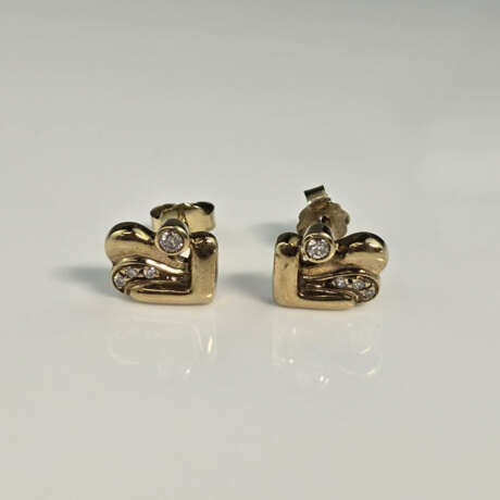 Ein Paar 14K-Diamant-Ohrstecker - Gelbgold 585/000 - photo 1