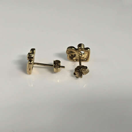 Ein Paar 14K-Diamant-Ohrstecker - Gelbgold 585/000 - photo 4