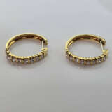 Ein Paar 18K-Goldcreolen mit Diamanten -- Gelbgold - photo 1