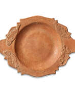 Посуда и сервировка стола. A ROMAN RED-SLIP WARE DISH