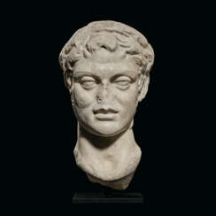 A ROMAN MARBLE HEAD OF A SATYR