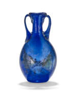 Aperçu. A ROMAN BLUE GLASS AMPHORISKOS