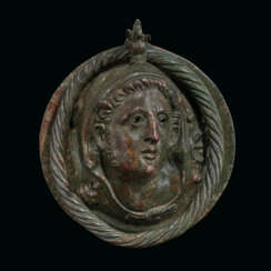 A GREEK BRONZE HERAKLES ROUNDEL