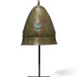 A GREEK BRONZE PILOS HELMET - Аукционные цены