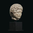 A ROMAN MARBLE HEAD OF A BARBARIAN - Аукционные цены