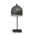 AN ITALIC BRONZE MONTEFORTINO HELMET - Auction prices