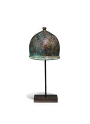 AN ITALIC BRONZE MONTEFORTINO HELMET