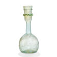 A ROMAN GREEN GLASS FLASK - Jetzt bei der Auktion