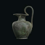 A ROMAN BRONZE TREFOIL OINOCHOE - photo 3