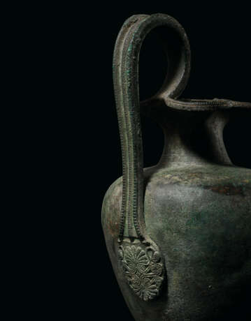 A ROMAN BRONZE TREFOIL OINOCHOE - photo 6