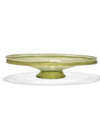 Посуда и сервировка стола. A ROMAN OLIVE GREEN GLASS DISH