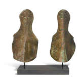 A PAIR OF ITALIC BRONZE ANKLE-GUARDS - photo 1