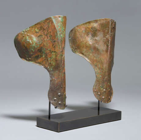 A PAIR OF ITALIC BRONZE ANKLE-GUARDS - photo 3