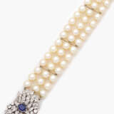 Prachtvolles Perlarmband mit Saphir- und Diamantbesatz - фото 1