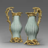 A PAIR OF LOUIS XV ORMOLU-MOUNTED CHINESE CELADON-GLAZED PORCELAIN EWERS - photo 1