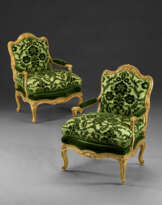 A PAIR OF LATE LOUIS XV GILTWOOD FAUTEUILS