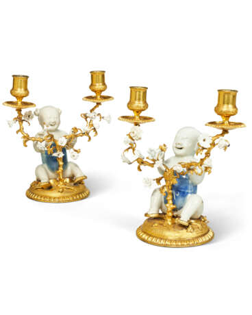 A PAIR OF LOUIS XV ORMOLU-MOUNTED CHINESE AND FRENCH PORCELAIN TWO BRANCH CANDELABRA - photo 1