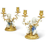 A PAIR OF LOUIS XV ORMOLU-MOUNTED CHINESE AND FRENCH PORCELAIN TWO BRANCH CANDELABRA - photo 1