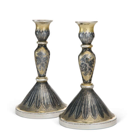 A PAIR OF RUSSIAN SILVER-GILT AND NIELLO CANDLESTICKS - photo 1