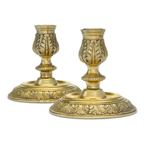 A PAIR OF RUSSIAN SILVER-GILT CANDLESTICKS - photo 1