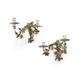 A NEAR PAIR OF AUSTRIAN ORMOLU AND ENAMEL TWO-BRANCH WALL-LIGHTS - photo 1