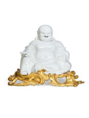 A LOUIS XV ORMOLU-MOUNTED CHINESE BLANC-DE-CHINE PORCELAIN FIGURE OF A LAUGHING BUDDHA