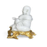 A LOUIS XV ORMOLU-MOUNTED CHINESE BLANC-DE-CHINE PORCELAIN FIGURE OF A LAUGHING BUDDHA - photo 3