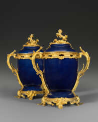 A PAIR OF LOUIS XV ORMOLU-MOUNTED CHINESE BLUE-GLAZED PORCELAIN POT-POURRI VASES