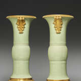 A PAIR OF LOUIS XVI ORMOLU-MOUNTED CHINESE CELADON-GLAZED PORCELAIN GU VASES - фото 2