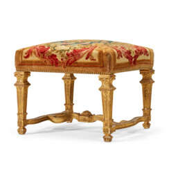 A LOUIS XIV STYLE GILTWOOD TABOURET UPHOLSTERED IN A SAVONNERIE CARPET FRAGMENT