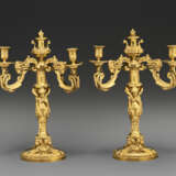 A PAIR OF LATE LOUIS XV ORMOLU THREE-BRANCH CANDELABRA - photo 1